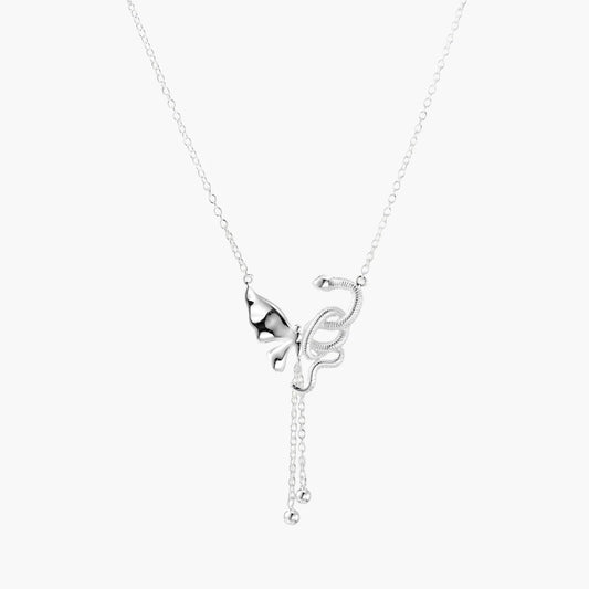 Silver necklace with a butterfly pendant on a white background