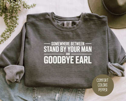 Somewhere Between Stand By Your Man and Goodbye Earl Comfort Colors Sweatshirt Sweatshirt  CreativeSpecialTs