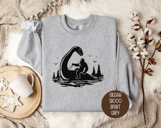 Bigfoot Riding Nessie Sweatshirt